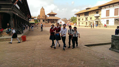 School children crossing Durbar Square in Bhaktapur